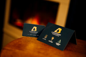 Longbow Venues gift cards displayed on a table
